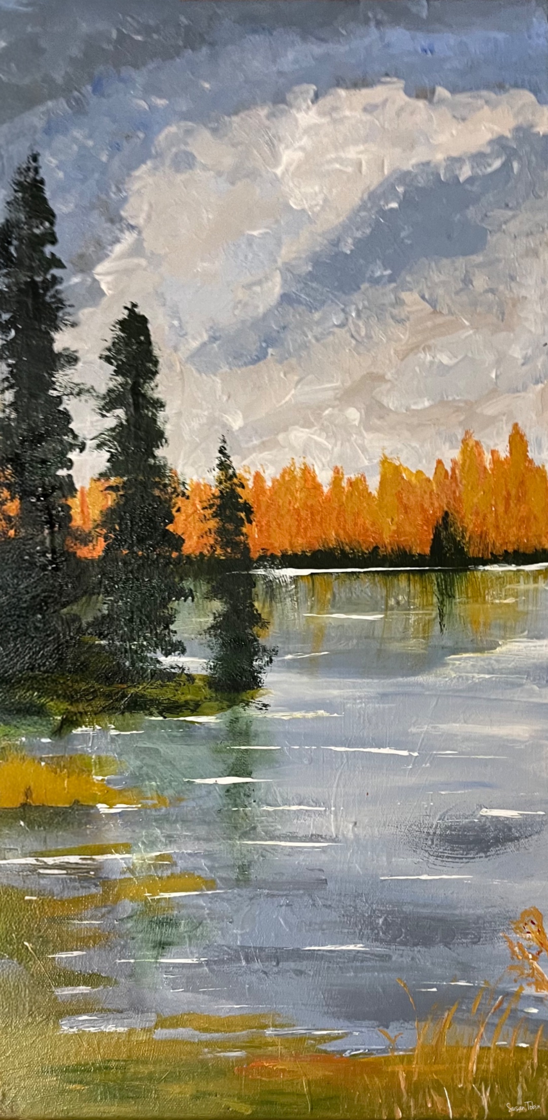 Between the Storms Stillness — quiet lake in autumn with storm clouds breaking